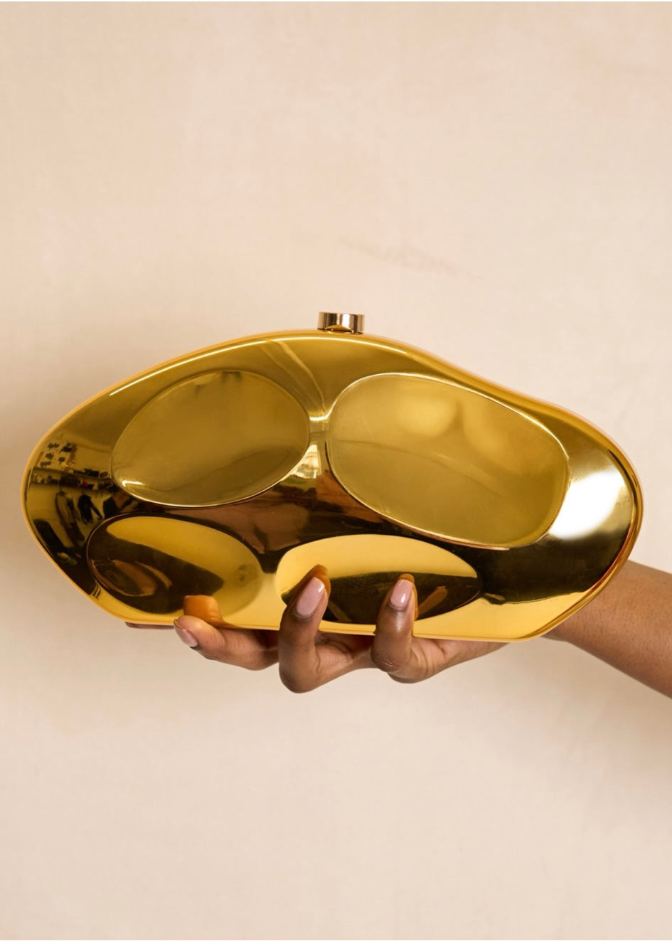 Gold aurum clutch